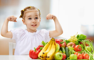 A beautiful girl eating fresh fruit