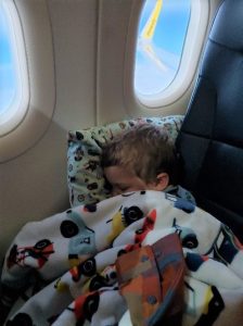 Caleb asleep on the plane