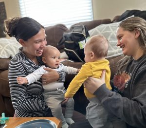 Natalia and Isaiah playing with another mom and baby