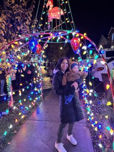 Natalia and Isaiah looking at Christmas lights December 2023