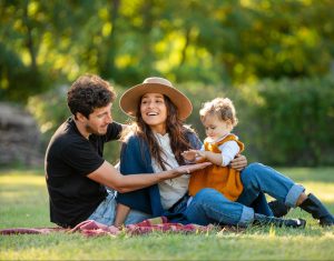 family playing in the park