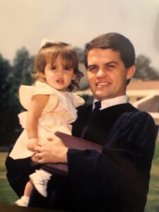 Tony hold his daughter