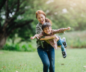 mother and son play in the park